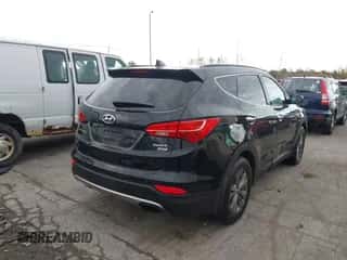 2016 Hyundai Santa Fe z VIN 5XYZUDLB2GG317413, wystawiony jako IAAI lot #43524563 z przebiegiem 167 905 mil mil oraz . Historia ofert i sprzedaży dostępna na DreamBid. Obrazek 4.
