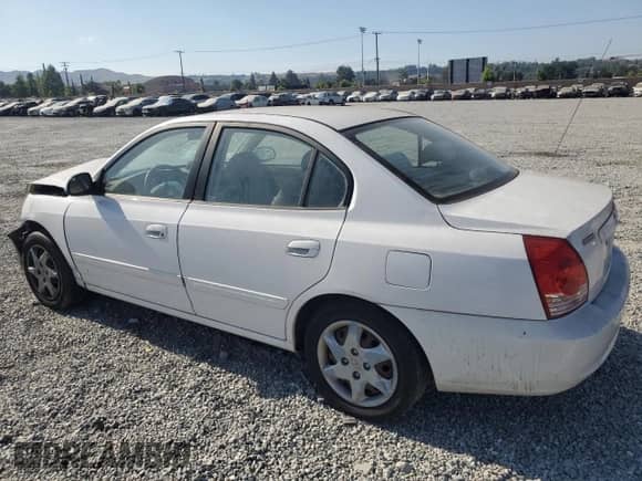 2006 Hyundai Elantra GLS with VIN KMHDN46D46U316129, listed as a Copart auction lot 64037434 with 102,404 mi miles and Salvage title. Bid and sale history available at DreamBid. Image 2.