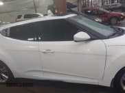 ✅ 2012 Hyundai Veloster w/Gray Int • VIN: KMHTC6AD1CU057986 • Lot: 41551354. Wystawiony na IAAI z przebiegiem 151 299 mil. Bezpłatny archiwum sprzedaży aukcyjnych z USA i szczegółowy raport historii pojazdu na DreamBid. Zdjęcie 13.