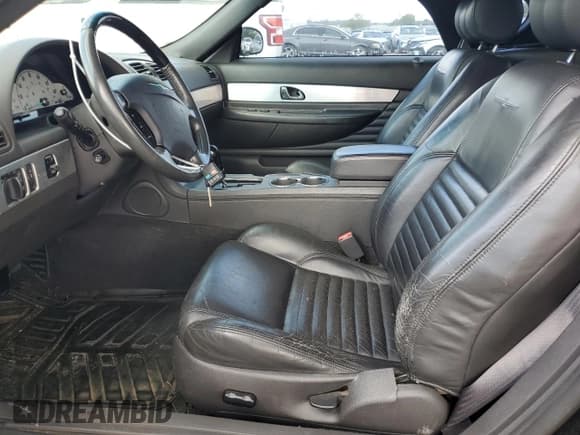 ✅ 2002 Ford Thunderbird Hardtop Premium • VIN: 1FAHP60A12Y104789 • Lot: 70710474. Wystawiony na Copart z przebiegiem 71 580 mil. Bezpłatny archiwum sprzedaży aukcyjnych z USA i szczegółowy raport historii pojazdu na DreamBid. Zdjęcie 7.