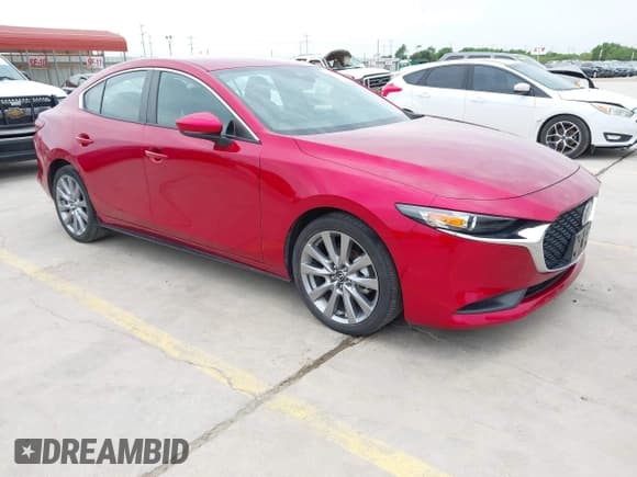 ✅ 2022 Mazda 3 Select • VIN: 3MZBPABL9NM316998 • Lot: 42117951. Listed on IAAI with 44,594 mi. Free auction sales archive from the USA and detailed vehicle history report at DreamBid. Image 1.