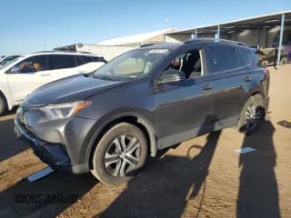 ✅ 2018 Toyota RAV4 LE • VIN: JTMBFREV0JJ739588 • Lot: 85723775. Listed on Copart with 123,603 mi. Free auction sales archive from the USA and detailed vehicle history report at DreamBid. Image 1.