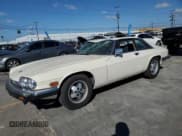 ✅ 1986 Jaguar XJ • VIN: SAJNV584XGC134035 • Lot: 56906985. Wystawiony na Copart z przebiegiem 22 429 mil. Bezpłatny archiwum sprzedaży aukcyjnych z USA i szczegółowy raport historii pojazdu na DreamBid. Zdjęcie 1.