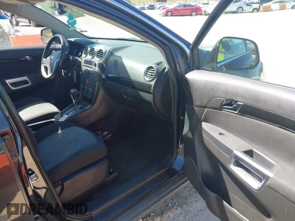 ✅ 2013 Chevrolet Captiva Sport LS • VIN: 3GNAL2EK4DS572812 • Lot: 41713918. Wystawiony na IAAI z przebiegiem 125 529 mil. Bezpłatny archiwum sprzedaży aukcyjnych z USA i szczegółowy raport historii pojazdu na DreamBid. Zdjęcie 5.