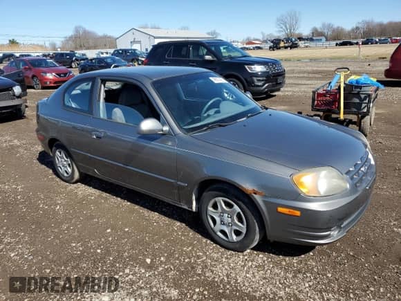 2005 Hyundai Accent GLS с VIN KMHCG35C65U331867, выставлен на аукционе Copart как лот 49637495 с пробегом 63 901 миль миль и Чистый • Clean title. История ставок и продаж доступна на DreamBid. Изображение 4.
