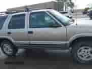 1998 Chevrolet Blazer LT with VIN 1GNDT13W6W2299562, listed as a IAAI auction lot 41569772 with 132,506 mi miles and . Bid and sale history available at DreamBid. Image 13.