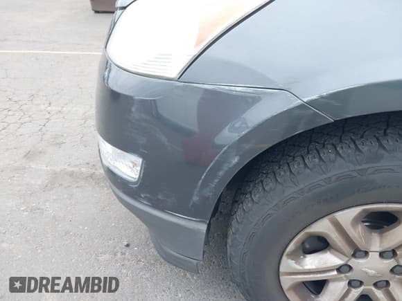 ✅ 2009 Chevrolet Traverse LS • VIN: 1GNEV13D59S142011 • Lot: 42514632. Wystawiony na IAAI z przebiegiem 163 103 mil. Bezpłatny archiwum sprzedaży aukcyjnych z USA i szczegółowy raport historii pojazdu na DreamBid. Zdjęcie 6.