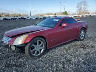 ✅ 2004 Cadillac XLR • VIN: 1G6YV34A945603839 • Lot: 47592565. Wystawiony na Copart z przebiegiem Nie podano. Bezpłatny archiwum sprzedaży aukcyjnych z USA i szczegółowy raport historii pojazdu na DreamBid. Zdjęcie 1.