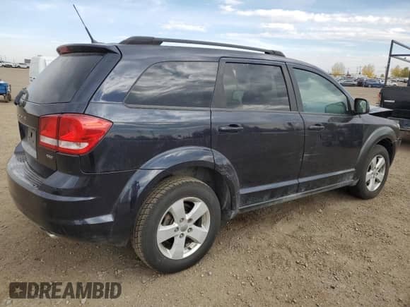 2011 Dodge Journey SXT с VIN 3D4PG5FG7BT511287, выставлен на аукционе Copart как лот 84292705 с пробегом 155 732 миль миль и Списание • Salvage title. История ставок и продаж доступна на DreamBid. Изображение 3.