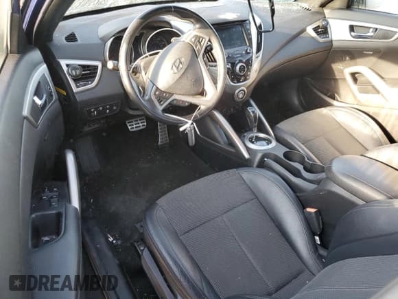 ✅ 2016 Hyundai Veloster • VIN: KMHTC6AD3GU249142 • Lot: 74515024. Listed on Copart with 65,693 mi. Free auction sales archive from the USA and detailed vehicle history report at DreamBid. Image 8.