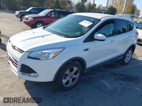✅ 2013 Ford Escape SE • VIN: 1FMCU9GX9DUC87292 • Lot: 43837293. Listed on IAAI with 140,103 mi. Free auction sales archive from the USA and detailed vehicle history report at DreamBid. Image 2.