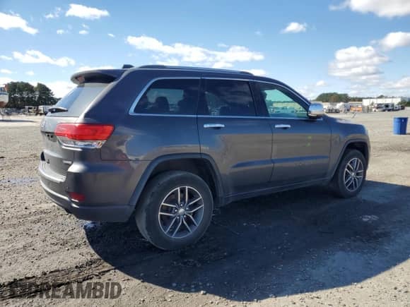 2018 Jeep Grand Cherokee Sterling z VIN 1C4RJFBG2JC195178, wystawiony jako Copart lot #90699395 z przebiegiem 194 766 mil mil oraz Czysty tytuł • Clean title. Historia ofert i sprzedaży dostępna na DreamBid. Obrazek 3.