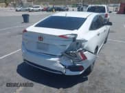 ✅ 2021 Honda Civic Touring • VIN: 19XFC1F95ME202228 • Lot: 42393281. Listed on IAAI with 83,868 mi. Free auction sales archive from the USA and detailed vehicle history report at DreamBid. Image 4.