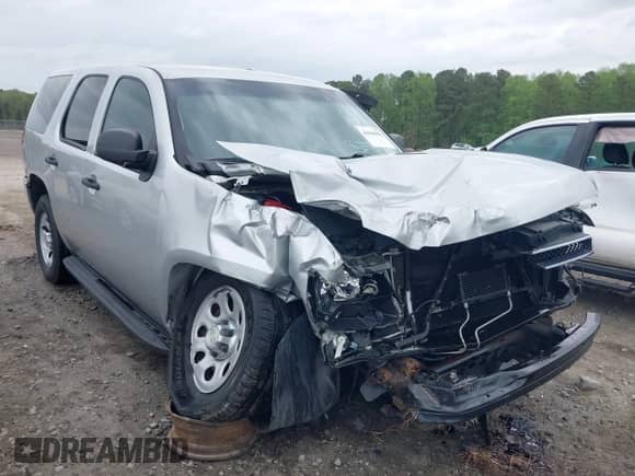2011 Chevrolet Tahoe Commercial with VIN 1GNSK2E04BR374401, listed as a IAAI auction lot 41960892 with 86,267 mi miles and . Bid and sale history available at DreamBid. Image 1.