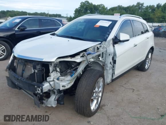 ✅ 2015 Cadillac SRX Performance Collection • VIN: 3GYFNFE34FS547964 • Lot: 43112616. Listed on IAAI with 101,352 mi. Free auction sales archive from the USA and detailed vehicle history report at DreamBid. Image 6.