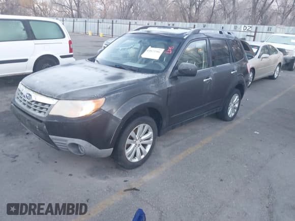 ✅ 2011 Subaru Forester X Limited • VIN: JF2SHAECXBH763563 • Lot: 43823586. Listed on IAAI with 186,204 mi. Free auction sales archive from the USA and detailed vehicle history report at DreamBid. Image 2.