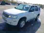 2005 Mercury Mariner Luxury z VIN 4M2CU56165DJ21267, wystawiony jako IAAI lot #41934003 z przebiegiem Nie podano mil oraz . Historia ofert i sprzedaży dostępna na DreamBid. Obrazek 18.