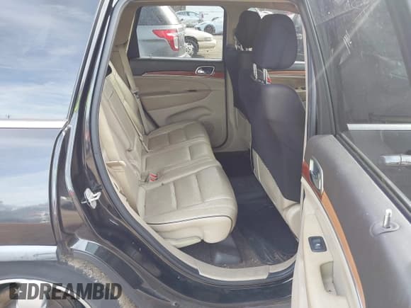 ✅ 2011 Jeep Grand Cherokee Overland • VIN: 1J4RR6GGXBC701952 • Lot: 43613546. Listed on IAAI with 191,267 mi. Free auction sales archive from the USA and detailed vehicle history report at DreamBid. Image 8.