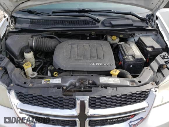 2013 Dodge Grand Caravan SXT с VIN 2C4RDGBG4DR814825, выставлен на аукционе Copart как лот 50268055 с пробегом 170 625 миль миль и Чистый • Clean title. История ставок и продаж доступна на DreamBid. Изображение 12.