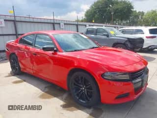 2018 Dodge Charger SXT z VIN 2C3CDXBGXJH313014, wystawiony jako IAAI lot #42959792 z przebiegiem 84 258 mil mil oraz . Historia ofert i sprzedaży dostępna na DreamBid. Obrazek 1.