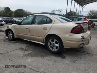 ✅ 2003 Pontiac Grand Am SE1 • VIN: 1G2NF52E13M631450 • Lot: 73240154. Wystawiony na Copart z przebiegiem 155 675 mil. Bezpłatny archiwum sprzedaży aukcyjnych z USA i szczegółowy raport historii pojazdu na DreamBid. Zdjęcie 2.