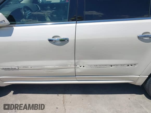 ✅ 2015 GMC Acadia Denali • VIN: 1GKKRTKD4FJ182633 • Lot: 43129349. Listed on IAAI with 156,036 mi. Free auction sales archive from the USA and detailed vehicle history report at DreamBid. Image 6.