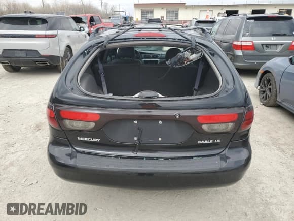 ✅ 2003 Mercury Sable LS Premium • VIN: 1MEHM59S83A615711 • Lot: 49820525. Listed on Copart with 108,594 mi. Free auction sales archive from the USA and detailed vehicle history report at DreamBid. Image 6.