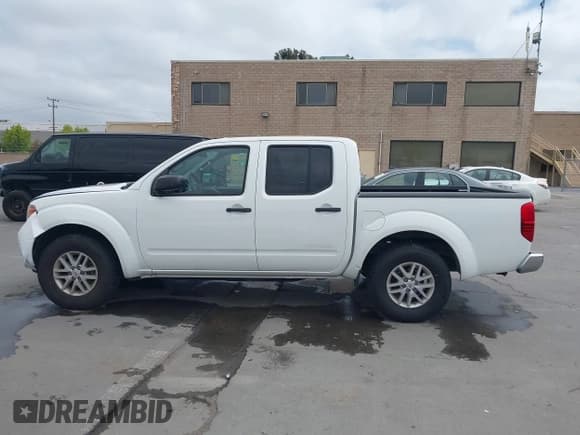 ✅ 2016 Nissan Frontier SV • VIN: 1N6AD0ER7GN737013 • Lot: 42106586. Listed on IAAI with 54,218 mi. Free auction sales archive from the USA and detailed vehicle history report at DreamBid. Image 14.