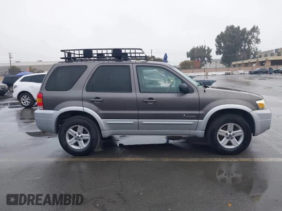 ✅ 2006 Ford Escape Hybrid • VIN: 1FMCU95H66KB49378 • Lot: 43725751. Wystawiony na IAAI z przebiegiem 239 245 mil. Bezpłatny archiwum sprzedaży aukcyjnych z USA i szczegółowy raport historii pojazdu na DreamBid. Zdjęcie 13.