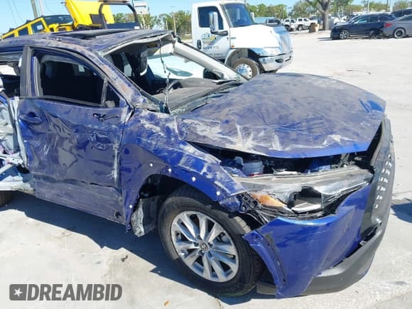 ✅ 2023 Toyota Corolla Cross LE • VIN: 7MUBAAAGXPV068892 • Lot: 41734428. Listed on IAAI with 12,790 mi. Free auction sales archive from the USA and detailed vehicle history report at DreamBid. Image 6.