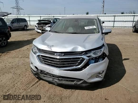 2018 Chevrolet Equinox LT с VIN 2GNAXJEV7J6263922, выставлен на аукционе Copart как лот 71521165 с пробегом 74 123 миль миль и Списание • Salvage title. История ставок и продаж доступна на DreamBid. Изображение 13.