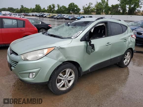 2013 Hyundai Tucson GLS z VIN KM8JU3AC4DU546815, wystawiony jako Copart lot #60543454 z przebiegiem 158 613 mil mil oraz Szkoda całkowita • Salvage title. Historia ofert i sprzedaży dostępna na DreamBid. Obrazek 1.