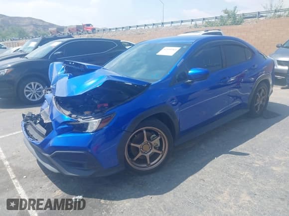 ✅ 2022 Subaru WRX • VIN: JF1VBAA64N9002223 • Lot: 42159263. Listed on IAAI with 29,730 mi. Free auction sales archive from the USA and detailed vehicle history report at DreamBid. Image 2.