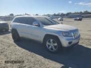 ✅ 2011 Jeep Grand Cherokee Overland • VIN: 1J4RR6GT7BC604866 • Lot: 91003765. Listed on Copart with 128,314 mi. Free auction sales archive from the USA and detailed vehicle history report at DreamBid. Image 4.