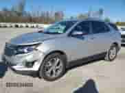 2018 Chevrolet Equinox Premier z VIN 3GNAXMEV1JS594725, wystawiony jako Copart lot #86439035 z przebiegiem 118 176 mil mil oraz Szkoda całkowita • Salvage title. Historia ofert i sprzedaży dostępna na DreamBid. Obrazek 1.