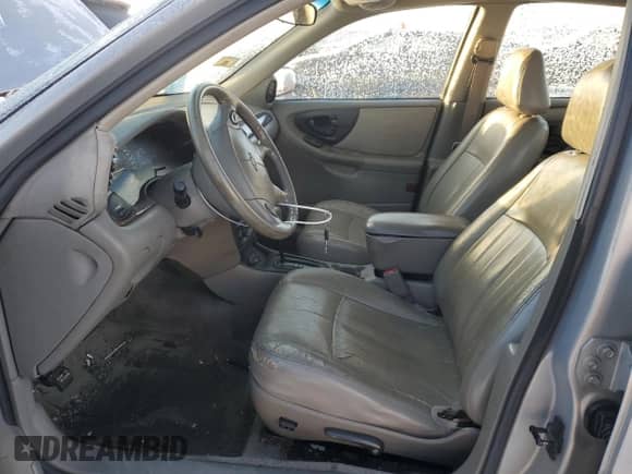 2000 Chevrolet Malibu LS z VIN 1G1NE52JXY6336007, wystawiony jako Copart lot #88655895 z przebiegiem 182 747 mil mil oraz Szkoda całkowita • Salvage title. Historia ofert i sprzedaży dostępna na DreamBid. Obrazek 7.