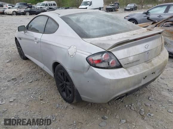 2008 Hyundai Tiburon GS с VIN KMHHM66D68U264666, выставлен на аукционе IAAI как лот 41970123 с пробегом 186 448 миль миль и . История ставок и продаж доступна на DreamBid. Изображение 3.
