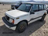 ✅ 1995 Suzuki Sidekick • VIN: JS3TD03V4S4113472 • Lot: 51279074. Listed on Copart with 199,736 mi. Free auction sales archive from the USA and detailed vehicle history report at DreamBid. Image 1.