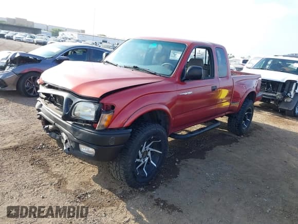 ✅ 2001 Toyota Tacoma PreRunner • VIN: 5TESN92N51Z853910 • Lot: 42596787. Listed on IAAI with 232,618 mi. Free auction sales archive from the USA and detailed vehicle history report at DreamBid. Image 2.