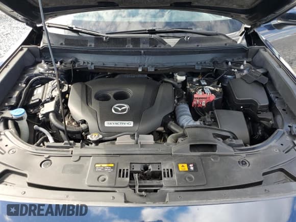 ✅ 2021 Mazda CX-9 Sport • VIN: JM3TCABY4M0517702 • Лот: 90798925. Опубликован ранее на Copart с пробегом 52 366 миль. Бесплатный доступ к архиву аукционных продаж из США и подробный отчёт об истории автомобиля на DreamBid. Изображение 12.