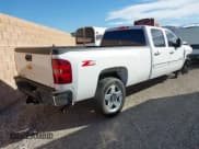 ✅ 2014 Chevrolet Silverado 2500HD LT • VIN: 1GC1CXCG5EF107871 • Lot: 43518202. Listed on IAAI with 74,569 mi. Free auction sales archive from the USA and detailed vehicle history report at DreamBid. Image 4.
