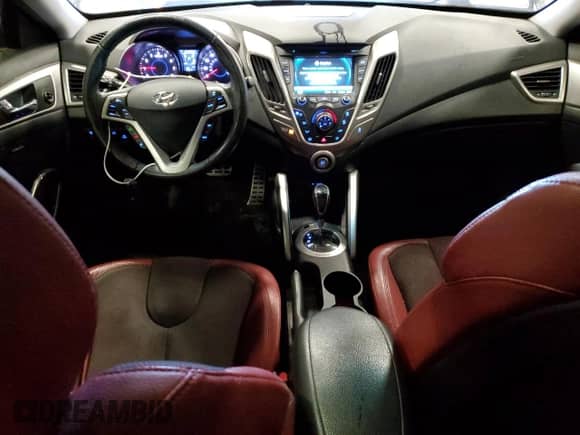 2012 Hyundai Veloster w/Gray Int с VIN KMHTC6AD3CU052773, выставлен на аукционе Copart как лот 70096015 с пробегом 154 233 миль миль и Чистый • Clean title. История ставок и продаж доступна на DreamBid. Изображение 8.