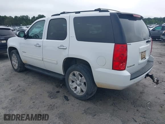 ✅ 2014 GMC Yukon SLT • VIN: 1GKS1CE08ER245345 • Lot: 42354541. Listed on IAAI with 243,152 mi. Free auction sales archive from the USA and detailed vehicle history report at DreamBid. Image 3.