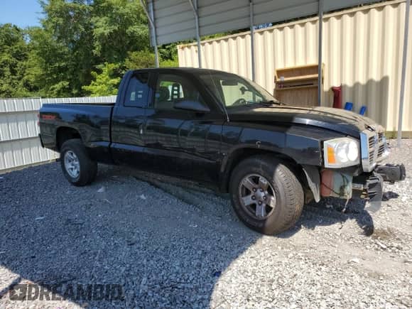 2006 Dodge Dakota SLT z VIN 1D7HE42N36S523634, wystawiony jako Copart lot #62717474 z przebiegiem 72 295 mil mil oraz Szkoda całkowita • Salvage title. Historia ofert i sprzedaży dostępna na DreamBid. Obrazek 4.