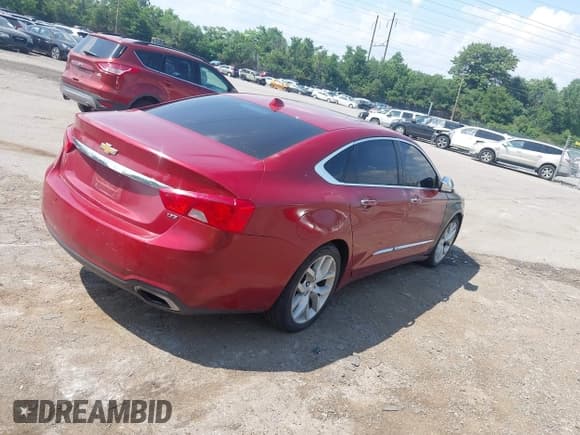 ✅ 2014 Chevrolet Impala LTZ • VIN: 2G1155S39E9285670 • Lot: 42587847. Listed on IAAI with 133,376 mi. Free auction sales archive from the USA and detailed vehicle history report at DreamBid. Image 4.