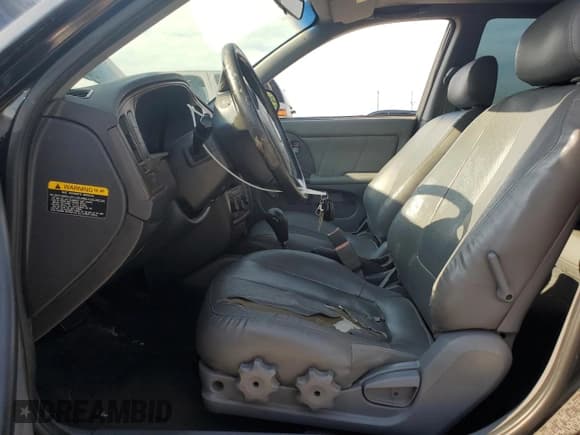 ✅ 2004 Hyundai Elantra GLS • VIN: KMHDN46D94U917890 • Lot: 60000025. Wystawiony na Copart z przebiegiem 158 474 mil. Bezpłatny archiwum sprzedaży aukcyjnych z USA i szczegółowy raport historii pojazdu na DreamBid. Zdjęcie 7.