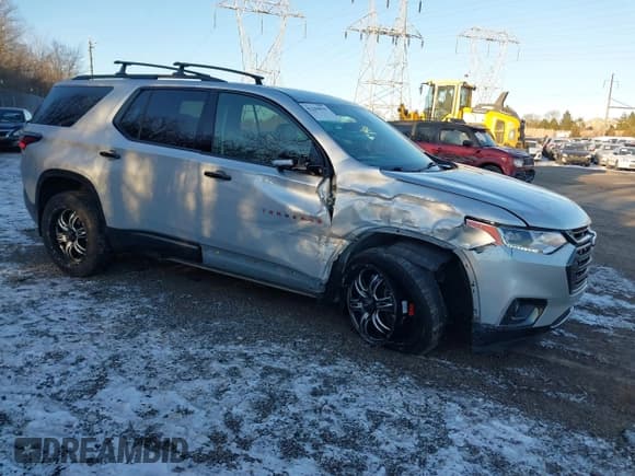✅ 2020 Chevrolet Traverse Premier • VIN: 1GNEVKKW0LJ296745 • Lot: 41284830. Listed on IAAI with 76,373 mi. Free auction sales archive from the USA and detailed vehicle history report at DreamBid. Image 1.