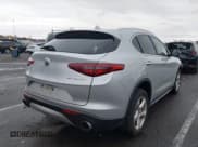 ✅ 2018 Alfa Romeo Stelvio • VIN: ZASFAKAN4J7C01719 • Lot: 43579591. Wystawiony na IAAI z przebiegiem 88 448 mil. Bezpłatny archiwum sprzedaży aukcyjnych z USA i szczegółowy raport historii pojazdu na DreamBid. Zdjęcie 4.