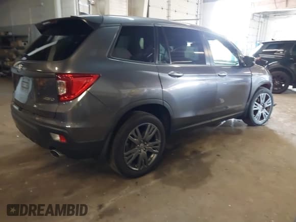 ✅ 2021 Honda Passport EX-L • VIN: 5FNYF8H56MB012533 • Lot: 42561010. Listed on IAAI with 40,568 mi. Free auction sales archive from the USA and detailed vehicle history report at DreamBid. Image 4.