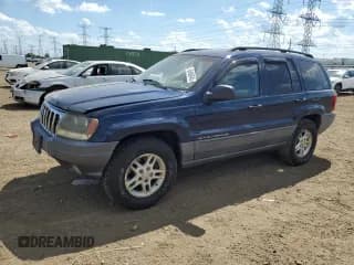 ✅ 2002 Jeep Grand Cherokee Laredo • VIN: 1J4GW48S92C316700 • Lot: 63496945. Listed on Copart with 143,908 mi. Free auction sales archive from the USA and detailed vehicle history report at DreamBid. Image 1.